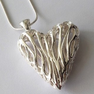 Fine silver hollow heart pendant with fixed triangular bail lazy loops