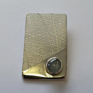 Sterling silver and dove grey start sapphire cabochon pendant
