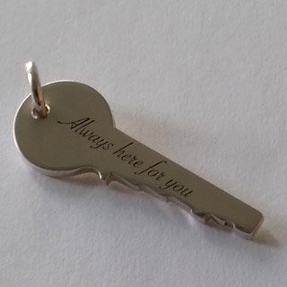 Sterling silver and laser engraved key pendant