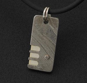 Men's pendant in sterling silver and stainless steel