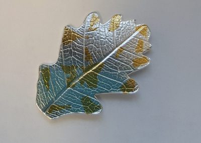 Silver leaf with gold foil pattern