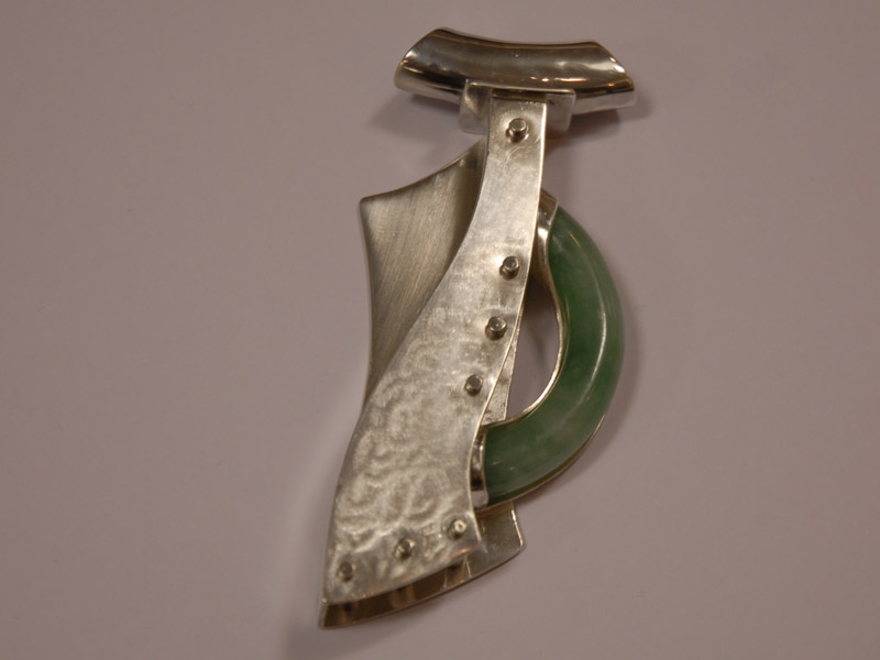 Jade and silver pendant